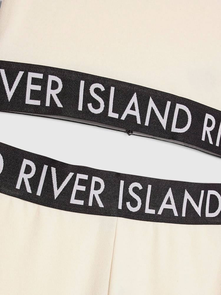 River Island Cream Logo T-Shirt & Kickflare Set - Image 4 of 4 River Island Cream Logo T-Shirt & Kickflare Set - Image 4 of 4
