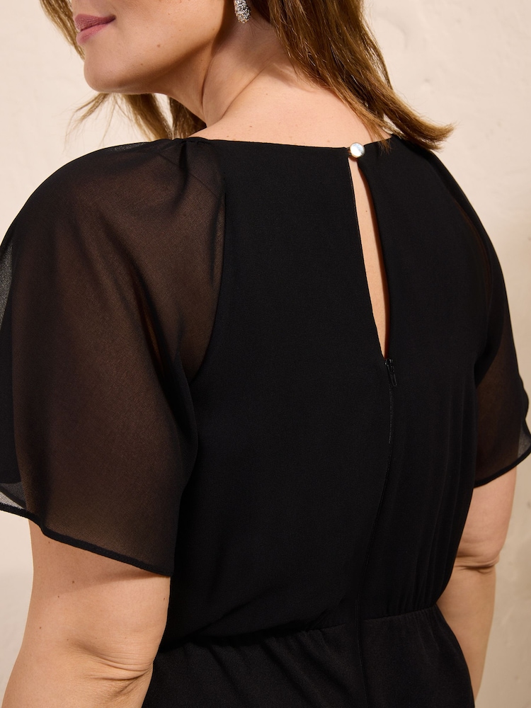 Friends Like These Black Curve Chiffon Flutter Sleeve Scuba Jumpsuit - Image 5 of 5 Friends Like These Black Curve Chiffon Flutter Sleeve Scuba Jumpsuit - Image 5 of 5
