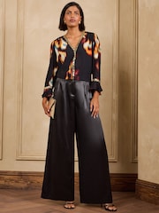 Love & Roses Black Abstract Print Sequin Trim 3/4 Flute Sleeve Blouse - Image 3 of 5
