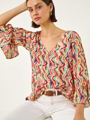 Roman Orange Abstract Wave Print Flared Sleeve Top - Image 1 of 5