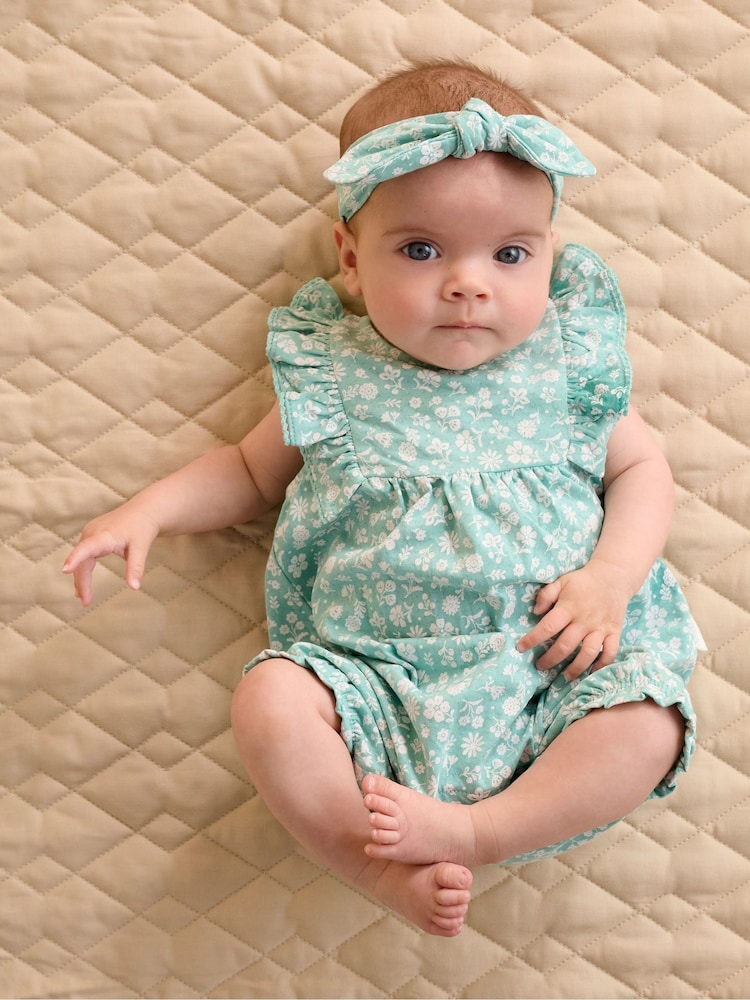 Purebaby Green Ruffle Floral Romper and Headband Set - Image 1 of 6 Purebaby Green Ruffle Floral Romper and Headband Set - Image 1 of 6