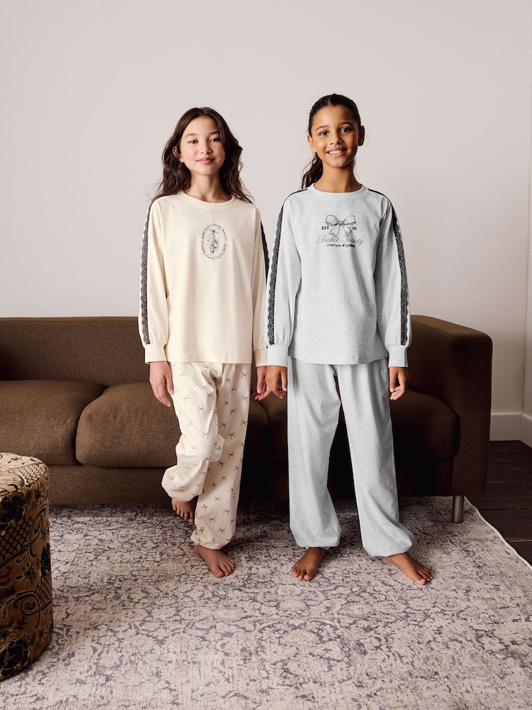 Black/Cream Jogger Pyjamas 2 Pack (3-16yrs) - Image 1 of 10 Black/Cream Jogger Pyjamas 2 Pack (3-16yrs) - Image 1 of 10