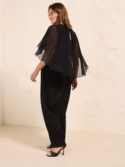 Friends Like These Black Curve Asymmetric Cape Sleeve Jumpsuit - Image 4 of 4