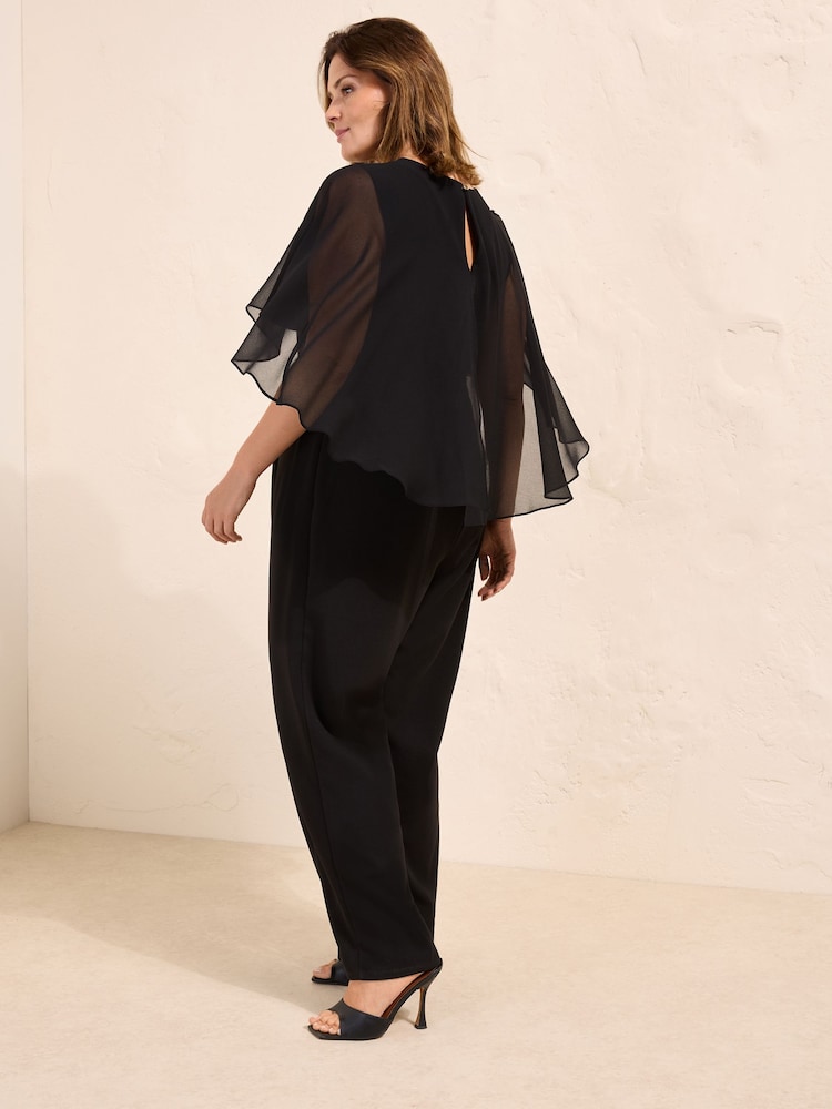 Friends Like These Black Curve Asymmetric Cape Sleeve Jumpsuit - Image 4 of 4