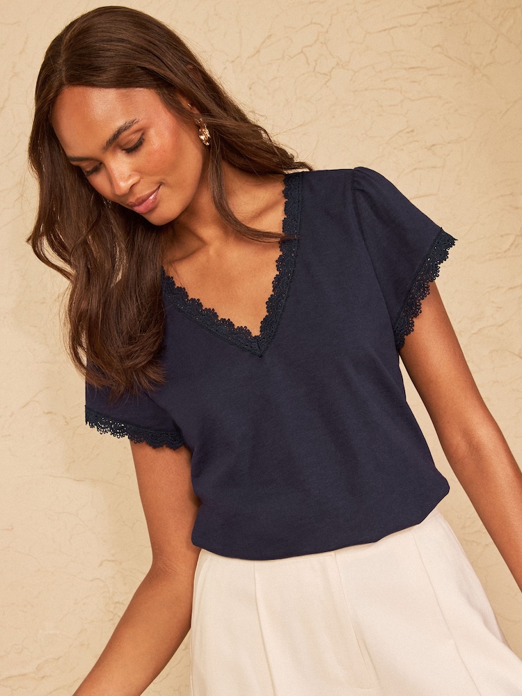 Love & Roses Navy Blue Lace Trim Flutter Sleeve V-Neck Top - Image 1 of 4