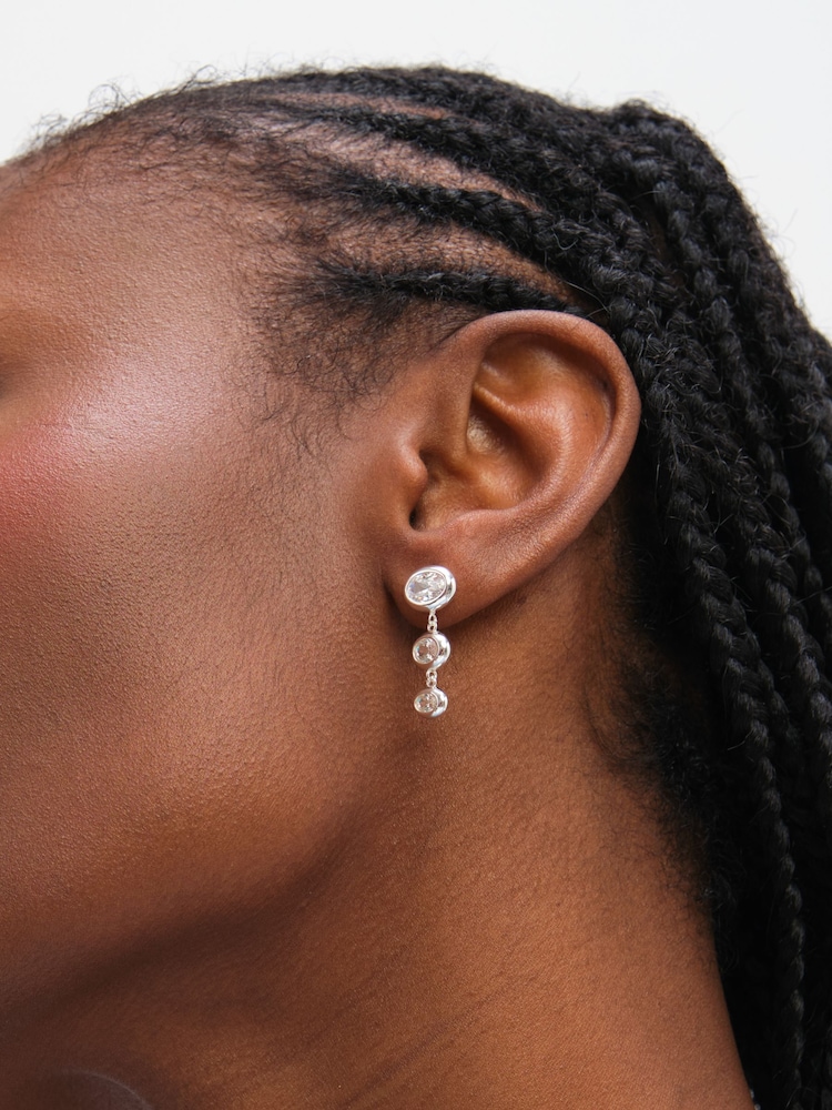 Inicio Silver Tone Graduated Cubic Zirconia Bezel Drop Earrings Gift Pouch - Image 1 of 3 Inicio Silver Tone Graduated Cubic Zirconia Bezel Drop Earrings Gift Pouch - Image 1 of 3