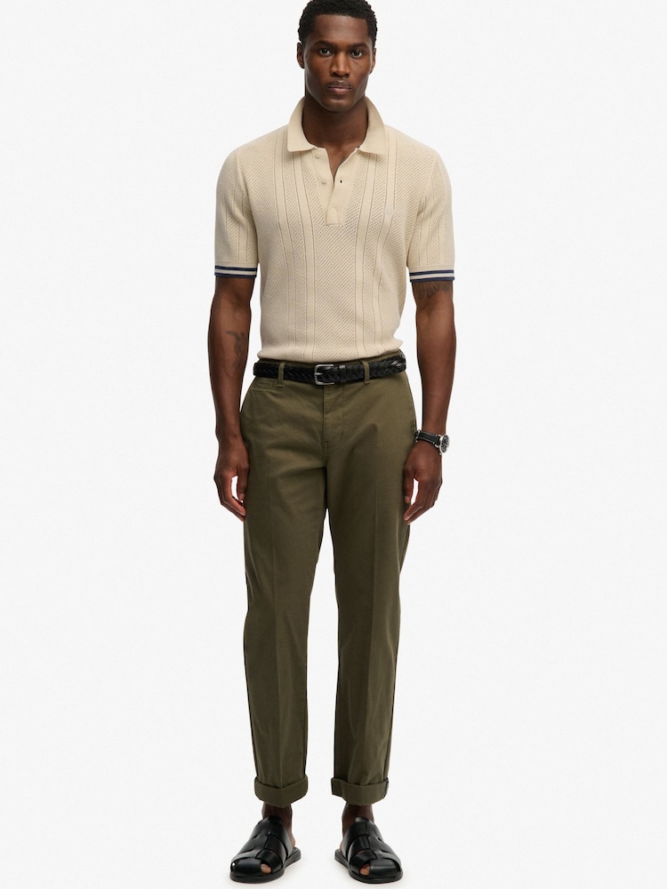 كريم - قميص بولو محبوك بارز الملمس بكُم قصير من Superdry - صورة 2 من 7