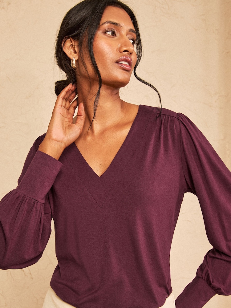 Love & Roses Burgundy Red V-Neck Jersey Top - Image 1 of 4 Love & Roses Burgundy Red V-Neck Jersey Top - Image 1 of 4