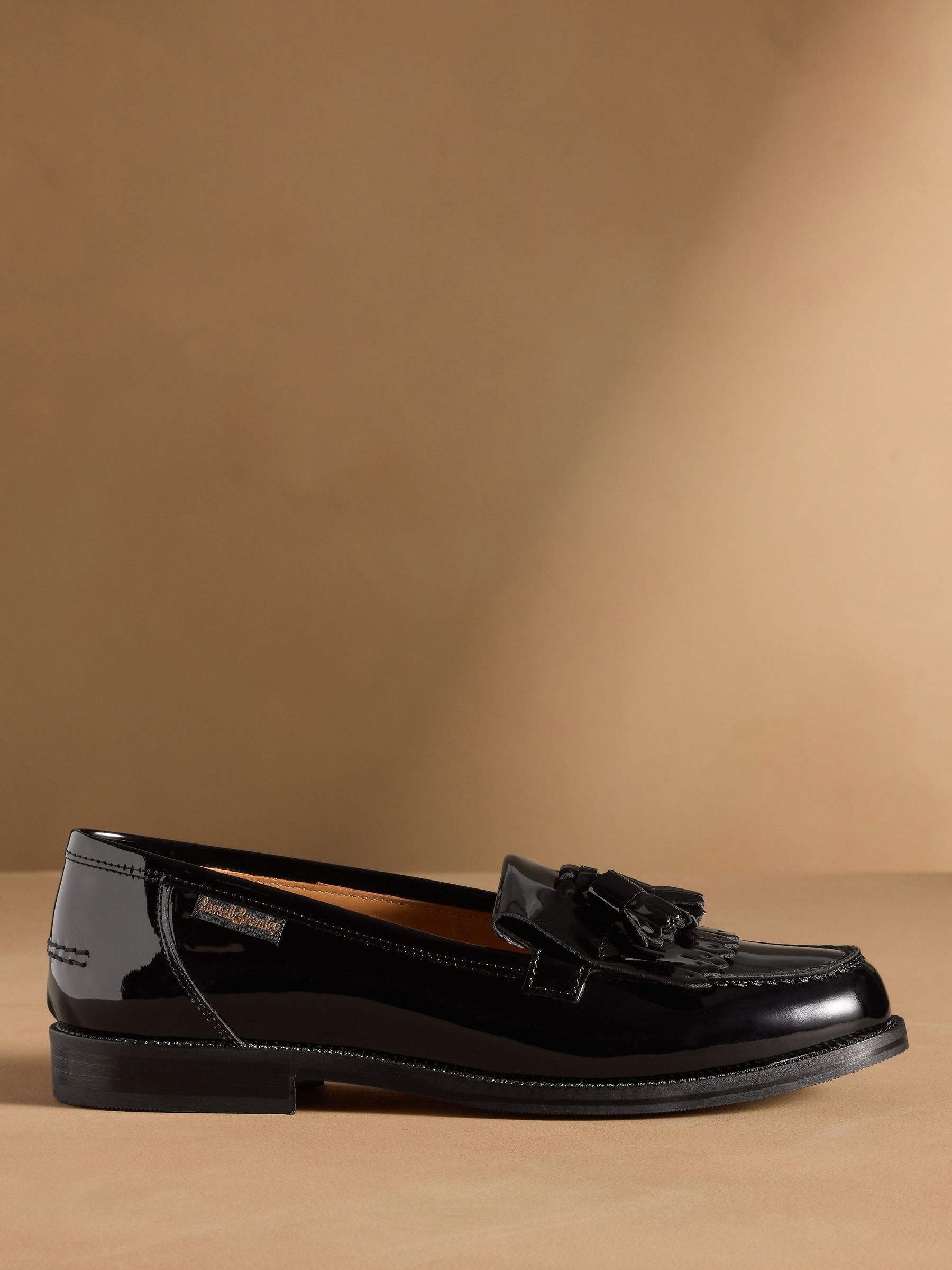 Buy Russell & Bromley Black Patent Chester Tassel Loafers from