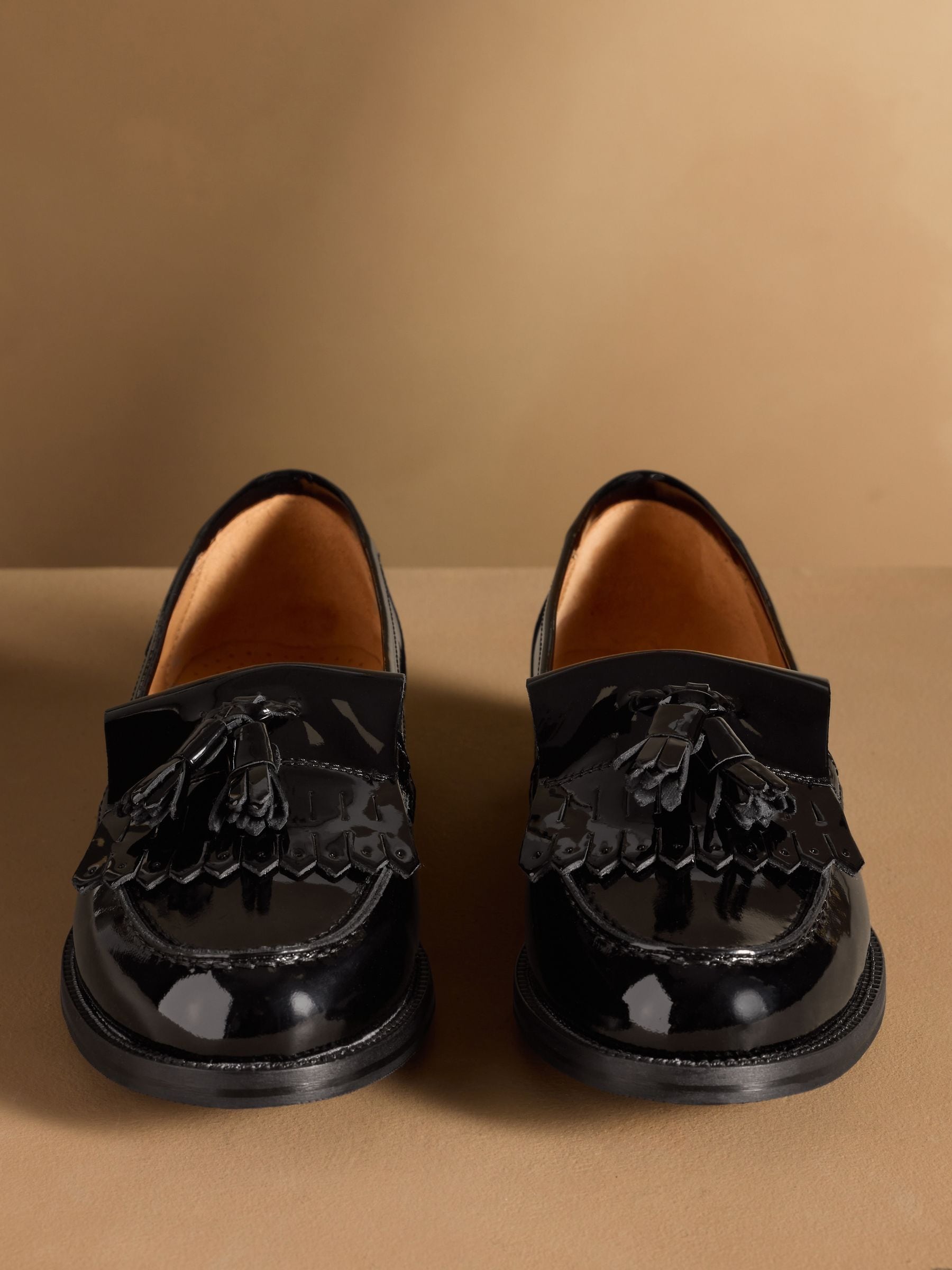 Buy Russell & Bromley Black Patent Chester Tassel Loafers from