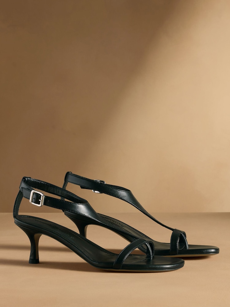 Russell & Bromley Black Edgebold T-Bar Heeled Sandals - Image 1 of 7 Russell & Bromley Black Edgebold T-Bar Heeled Sandals - Image 1 of 7