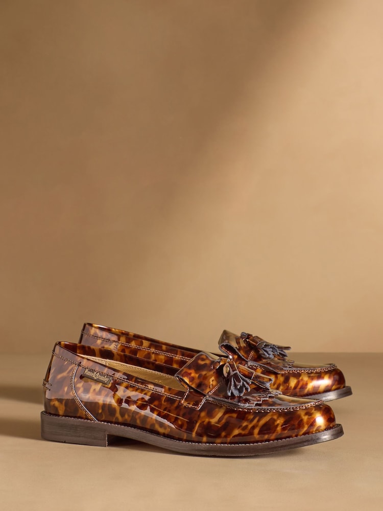 Russell & Bromley Tortoiseshell Brown Chester Tassel Loafers - Image 1 of 7 Russell & Bromley Tortoiseshell Brown Chester Tassel Loafers - Image 1 of 7