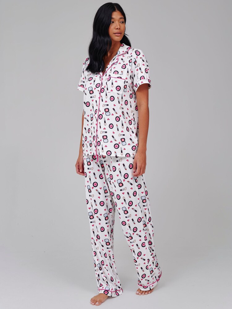 Loungeable Pink Make Up Short Sleeve Shirt And Trousers Button Through Pyjama Set - Image 1 of 5 Loungeable Pink Make Up Short Sleeve Shirt And Trousers Button Through Pyjama Set - Image 1 of 5
