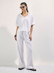 River Island מכנסיים אלסטיים מתערובת פשתן בגזרת קרסול צרה - תמונה 1 מתוך 4