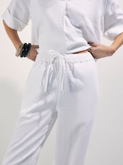 River Island מכנסיים אלסטיים מתערובת פשתן בגזרת קרסול צרה - תמונה 2 מתוך 4