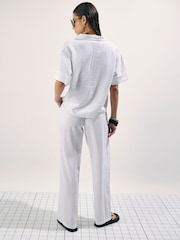 River Island מכנסיים אלסטיים מתערובת פשתן בגזרת קרסול צרה - תמונה 4 מתוך 4