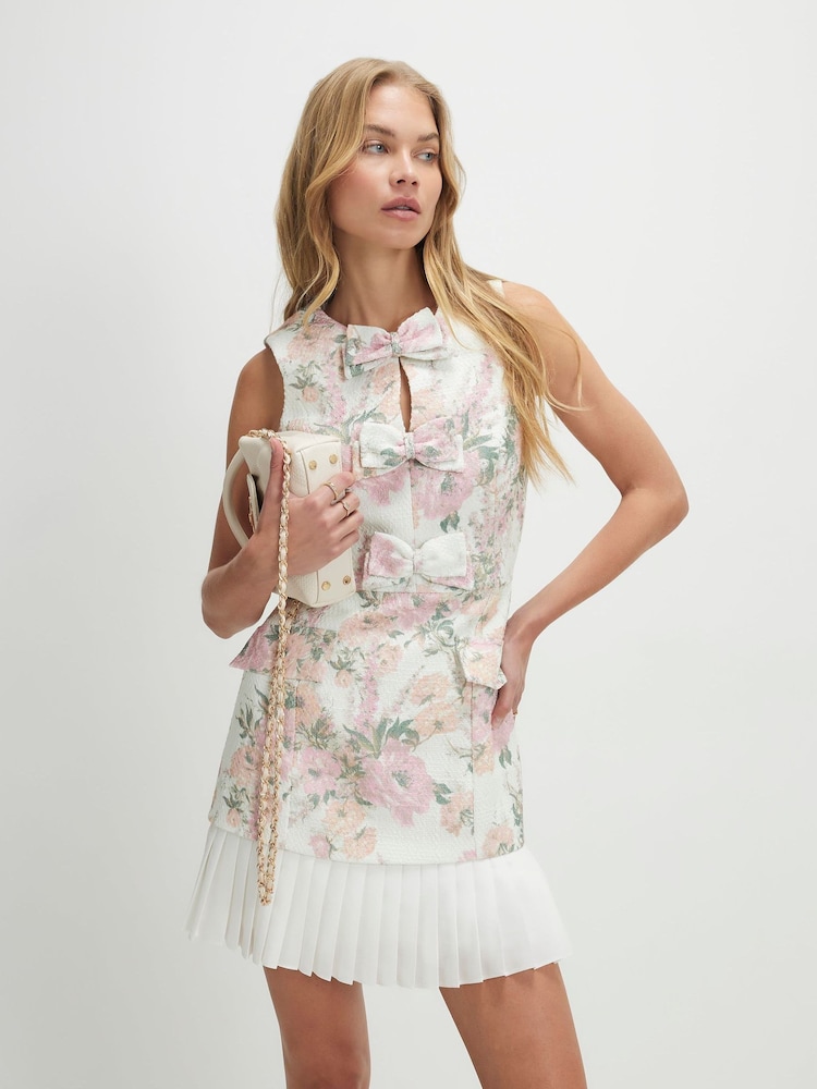 River Island Sleeveless Floral Bow Front Boucle Mini Dress - Image 1 of 4 River Island Sleeveless Floral Bow Front Boucle Mini Dress - Image 1 of 4