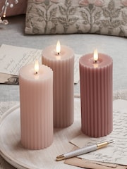 Lights4fun Set of 2 Blush Pink TruGlow Slim Pillar Candles - Image 1 of 4