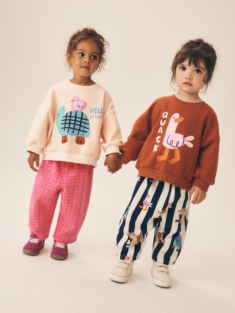 Pink/Ecru Duck Character Sweatshirt and Barrel Trousers Set 2 Pack (3mths-7yrs) - Image 2 of 5 Pink/Ecru Duck Character Sweatshirt and Barrel Trousers Set 2 Pack (3mths-7yrs) - Image 2 of 5
