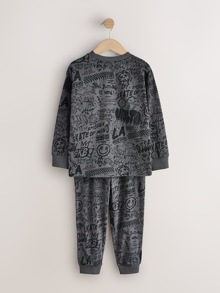 Grey/Red/Blue Graffiti Long Sleeve Pyjamas 3 Pack (3-16yrs) - Image 1 of 7 Grey/Red/Blue Graffiti Long Sleeve Pyjamas 3 Pack (3-16yrs) - Image 1 of 7