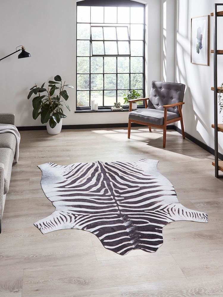 Think Rugs Black Faux Print Zebra Animal Print Rug - Image 1 of 6 Think Rugs Black Faux Print Zebra Animal Print Rug - Image 1 of 6