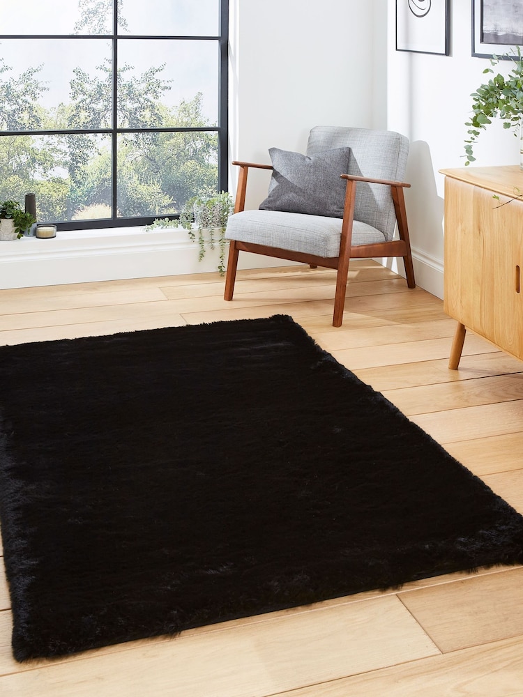 Think Rugs Black Super Teddy Plain Shaggy Rug - Image 1 of 6 Think Rugs Black Super Teddy Plain Shaggy Rug - Image 1 of 6
