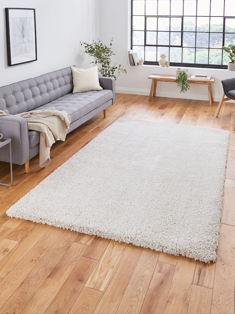 Think Rugs Cream Sierra 9000 Plain Shaggy Rug - Image 1 of 5 Think Rugs Cream Sierra 9000 Plain Shaggy Rug - Image 1 of 5