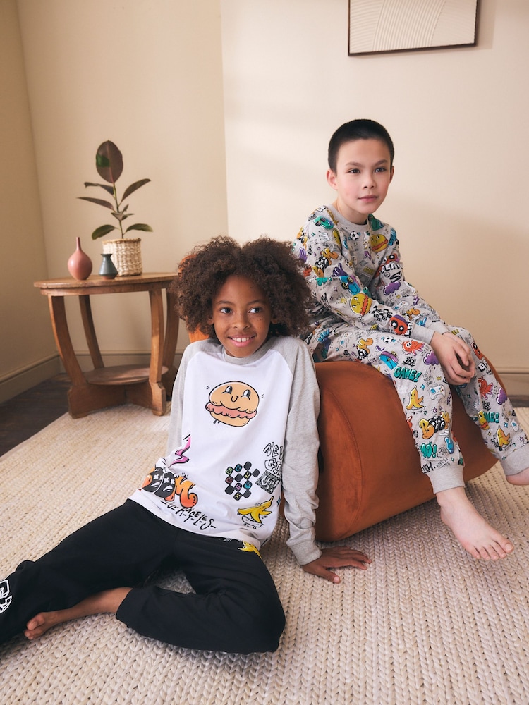 Bright Doodle Long Sleeve Pyjamas 2 Pack (3-16yrs) - Image 1 of 7 Bright Doodle Long Sleeve Pyjamas 2 Pack (3-16yrs) - Image 1 of 7