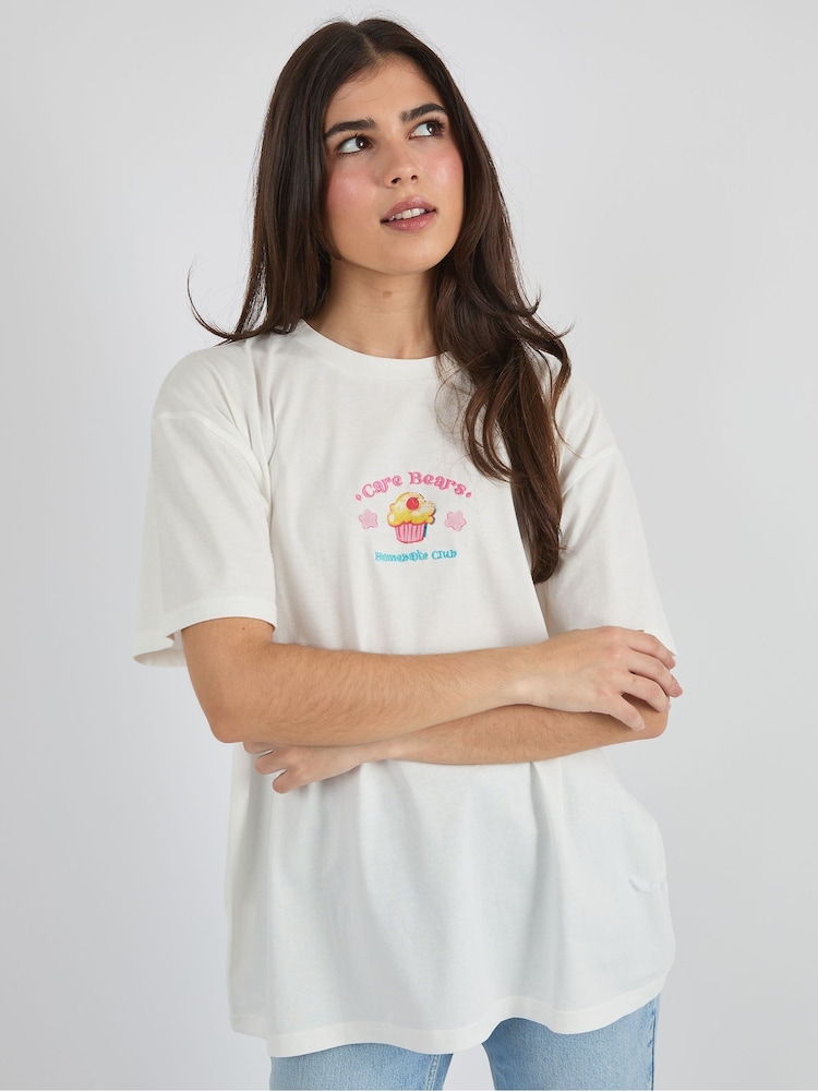 Skinnydip White Care Bears x Skinnydip Homebake Club T-Shirt - Image 1 of 3 Skinnydip White Care Bears x Skinnydip Homebake Club T-Shirt - Image 1 of 3