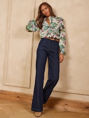Love & Roses Ruffle Front Long Sleeve Blouse - Attēls 3 no 5