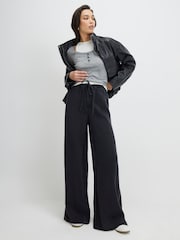 River Island Black High Rise Tie Front Wide Leg Pyjama Style Jeans - Image 1 of 4