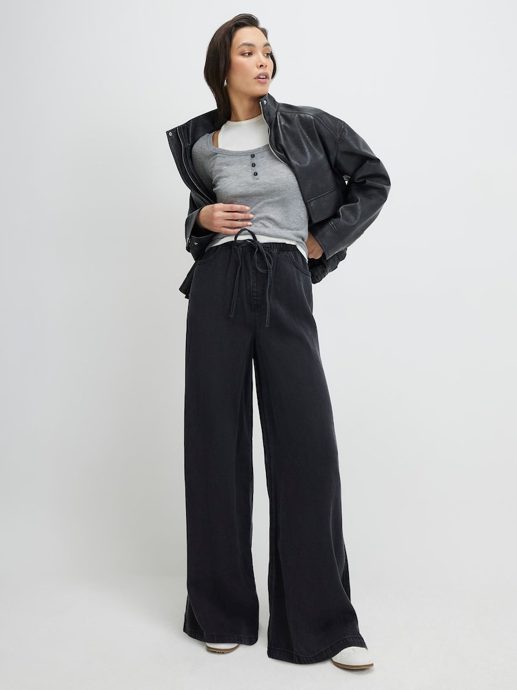 River Island Black High Rise Tie Front Wide Leg Pyjama Style Jeans - Image 1 of 4