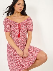 فستان برباط شرَّابة بطبعة مورّدة للأحجام الصغيرة من Roman - Image 1 of 5