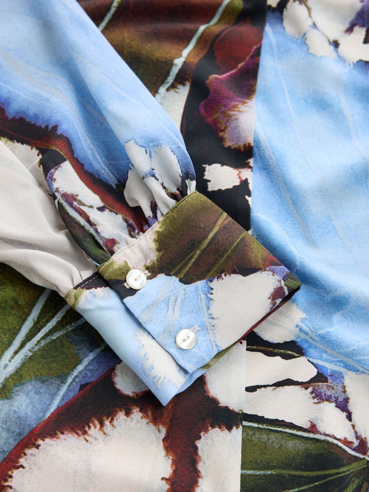 Blue Animal Print Long Sleeved V-Neck Cuff Top - Image 7 of 7 Blue Animal Print Long Sleeved V-Neck Cuff Top - Image 7 of 7