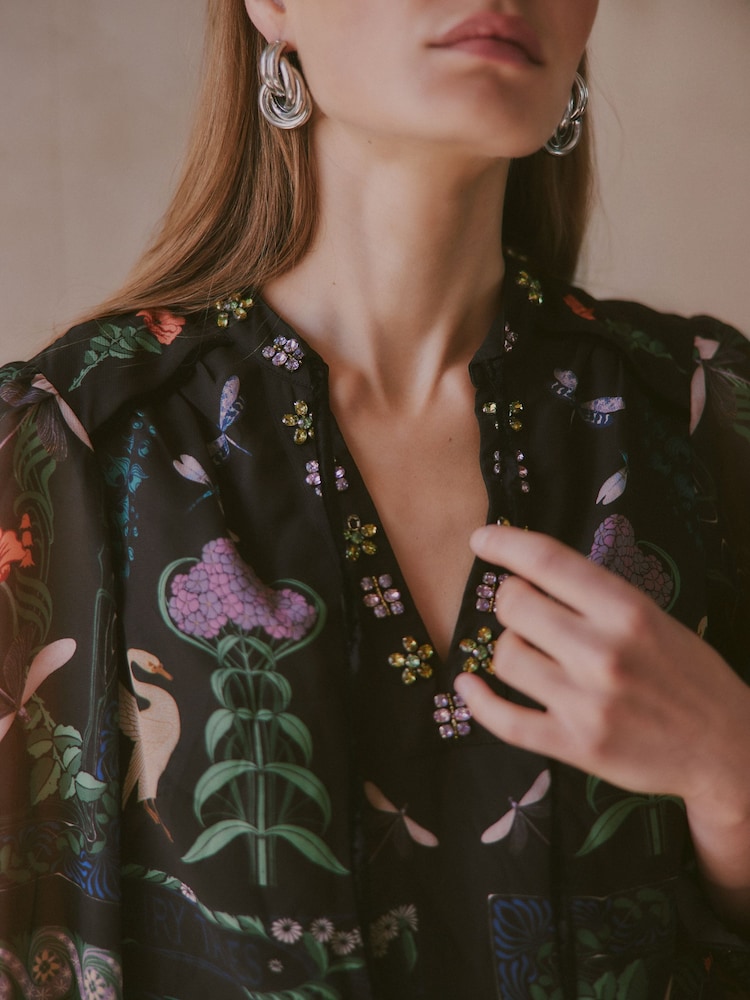 Love & Roses X V&A Black Petite Printed Embellished Neck Drop Waist Mini Dress - Image 2 of 6 Love & Roses X V&A Black Petite Printed Embellished Neck Drop Waist Mini Dress - Image 2 of 6