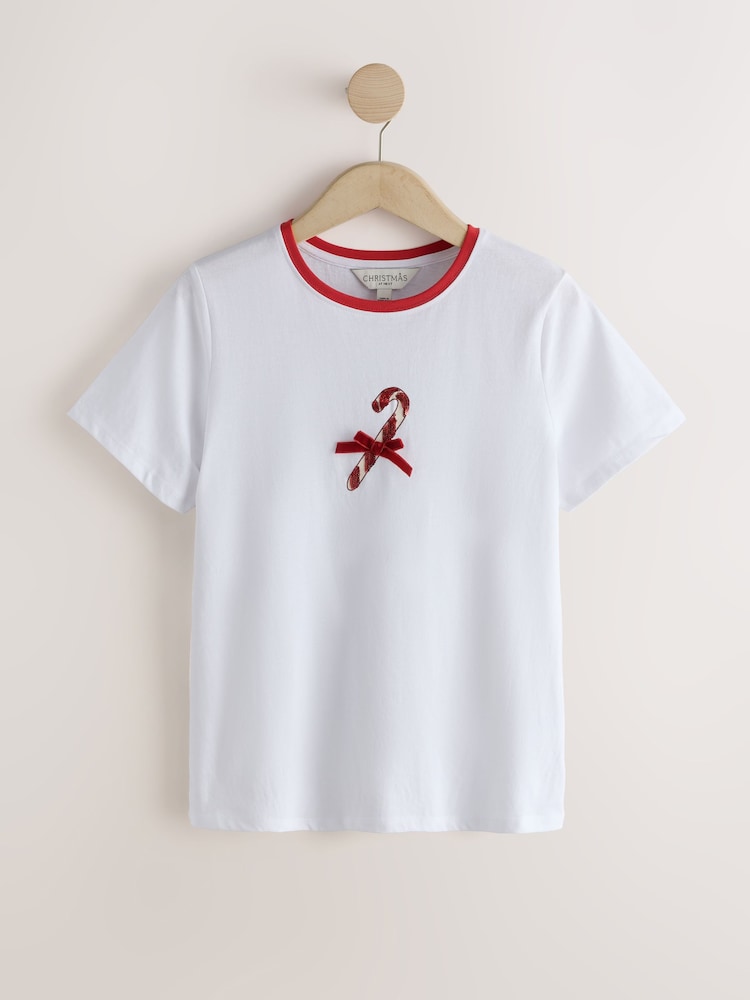 Ecru Christmas Candy Cane Graphic Ringer Short Sleeve T-Shirt - Image 1 of 3 Ecru Christmas Candy Cane Graphic Ringer Short Sleeve T-Shirt - Image 1 of 3