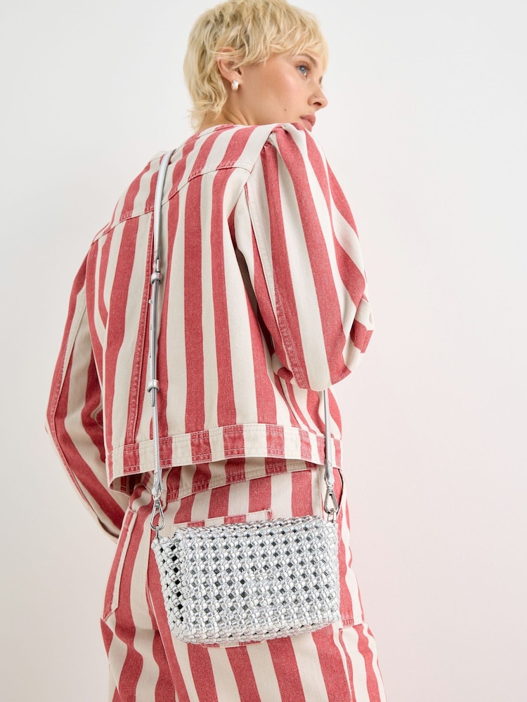 Oliver Bonas Silver Silver Metallic Braided Crossbody Bag - Image 1 of 7 Oliver Bonas Silver Silver Metallic Braided Crossbody Bag - Image 1 of 7