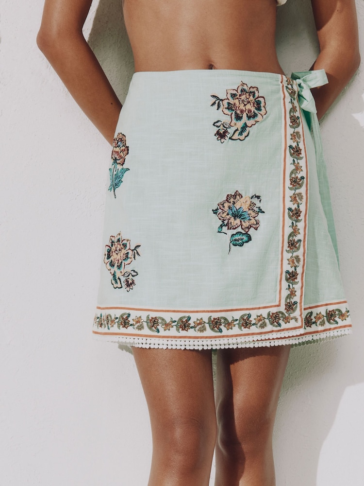 Mint Green Floral Embroidered Wrap Mini Skirt - Image 1 of 4 Mint Green Floral Embroidered Wrap Mini Skirt - Image 1 of 4