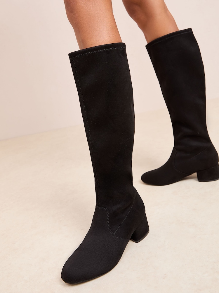 Friends Like These Black Low Block Heel Stretch Long Knee High Sock Boots - Image 1 of 4 Friends Like These Black Low Block Heel Stretch Long Knee High Sock Boots - Image 1 of 4