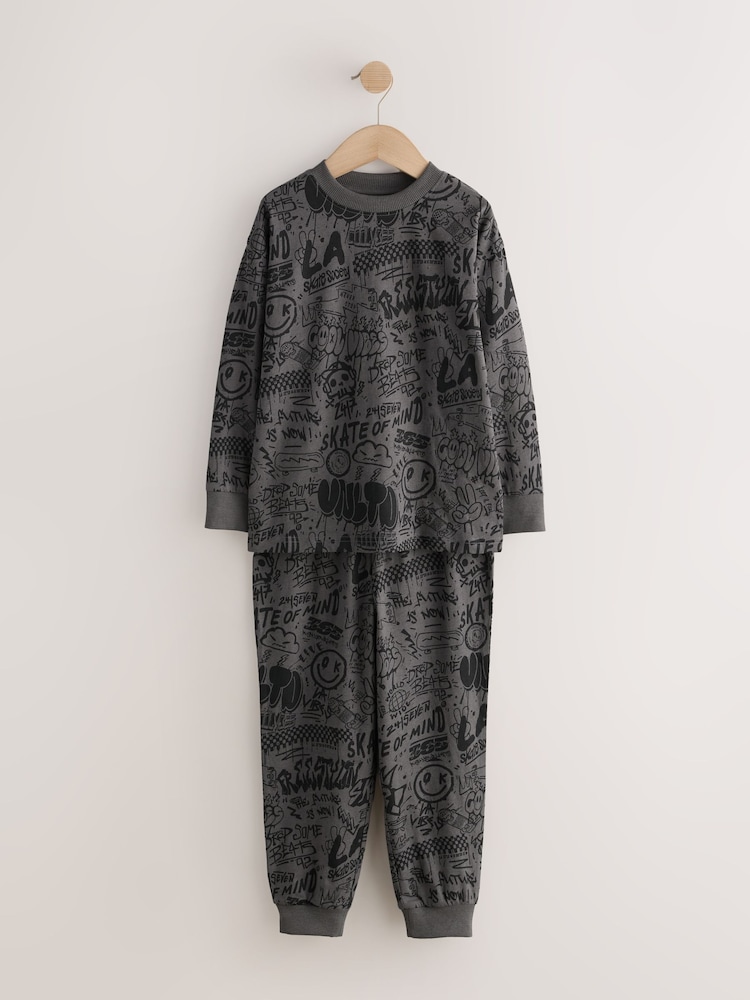 Charcoal Grey Graffiti Single Jogger Pyjamas (3-16yrs) - Image 1 of 4 Charcoal Grey Graffiti Single Jogger Pyjamas (3-16yrs) - Image 1 of 4
