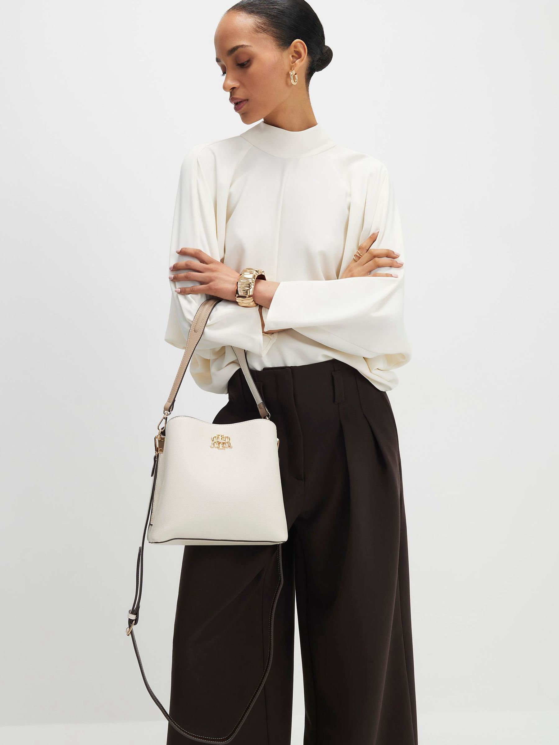 Buy River Island Cream Lock Front Bucket Bag from Next USA