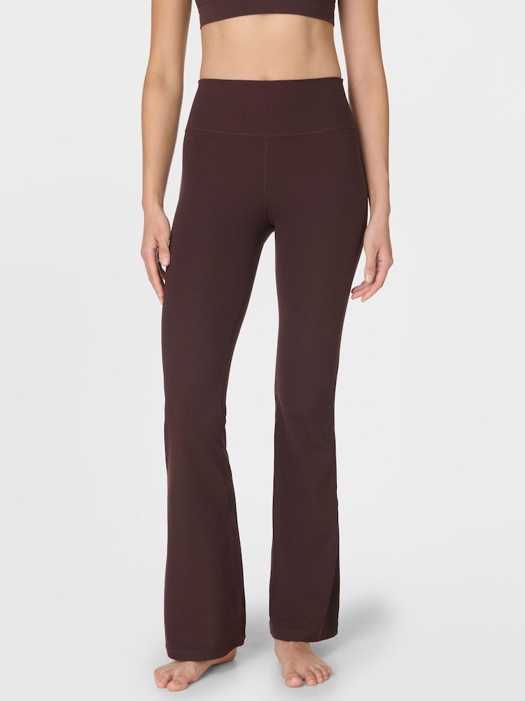 Sweaty Betty Brown Glow Flex Rib 32" Flare Trousers - Image 1 of 7 Sweaty Betty Brown Glow Flex Rib 32" Flare Trousers - Image 1 of 7