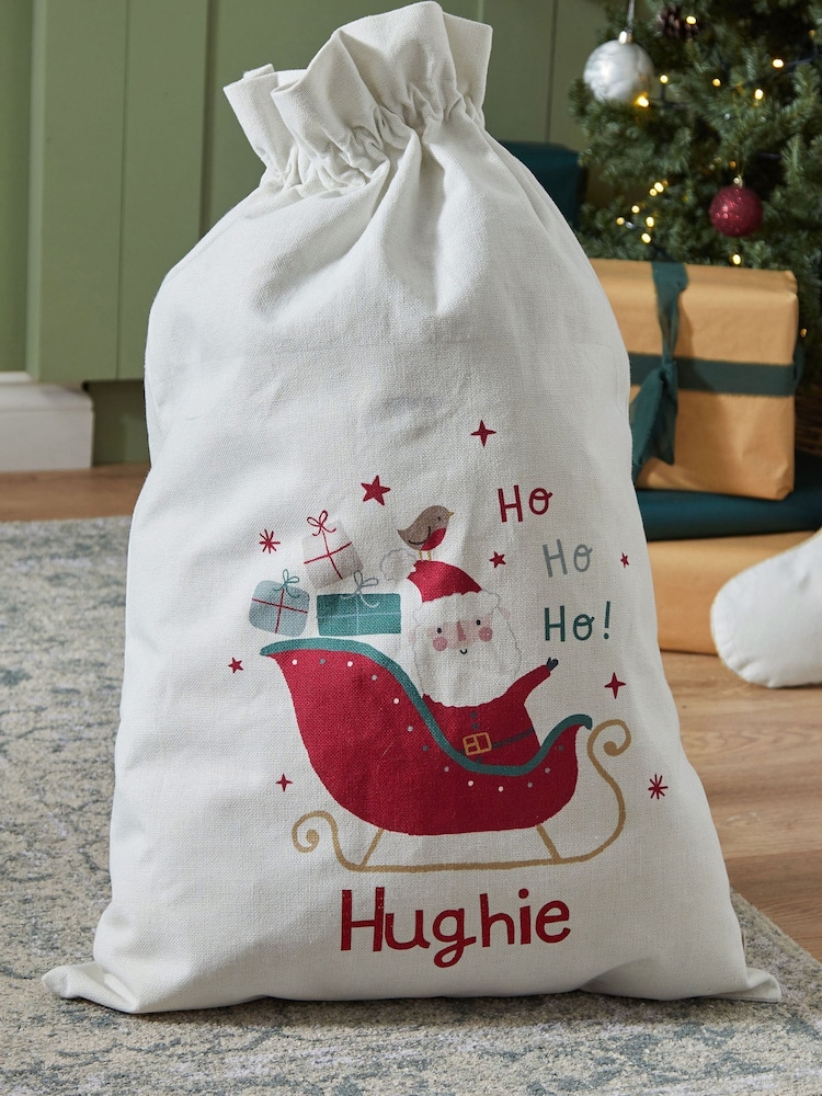 Personalised Santa Sleigh Canvas Christmas Gift Sack by My 1st Years - Image 1 of 4 Personalised Santa Sleigh Canvas Christmas Gift Sack by My 1st Years - Image 1 of 4