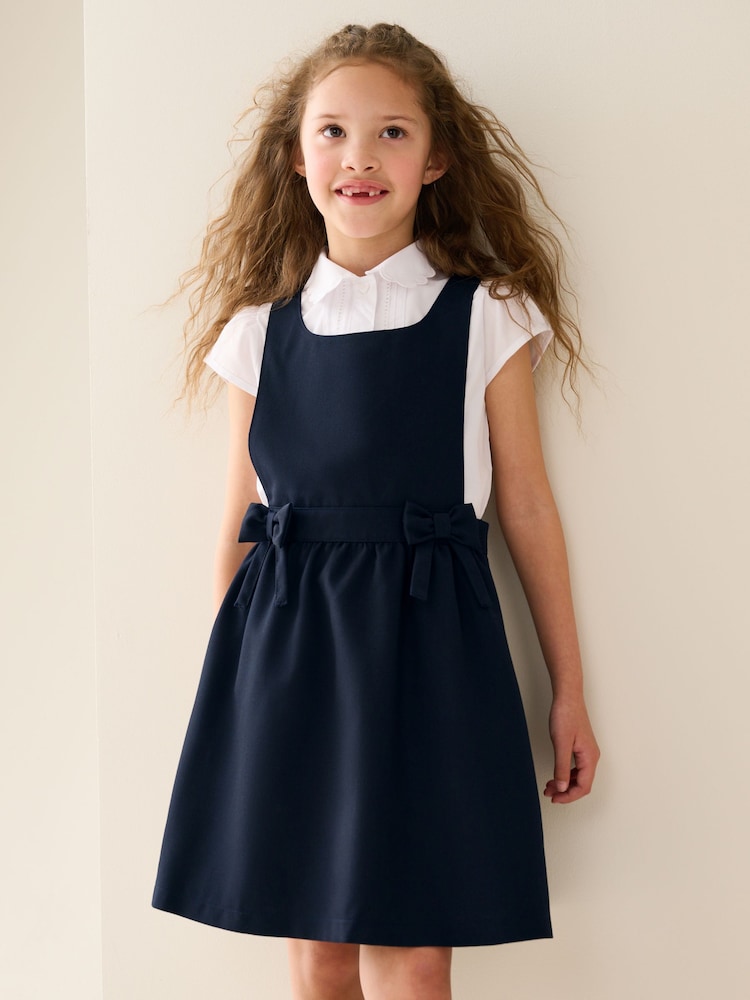 Navy Blue Bow Waist School Pinafore Dress (3-14yrs) - Image 1 of 10 Navy Blue Bow Waist School Pinafore Dress (3-14yrs) - Image 1 of 10