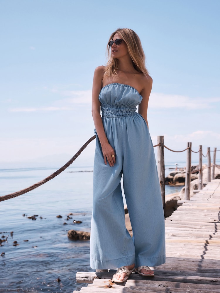 Dark Blue Bandeau Shirred Denim Jumpsuit - Image 1 of 7 Dark Blue Bandeau Shirred Denim Jumpsuit - Image 1 of 7