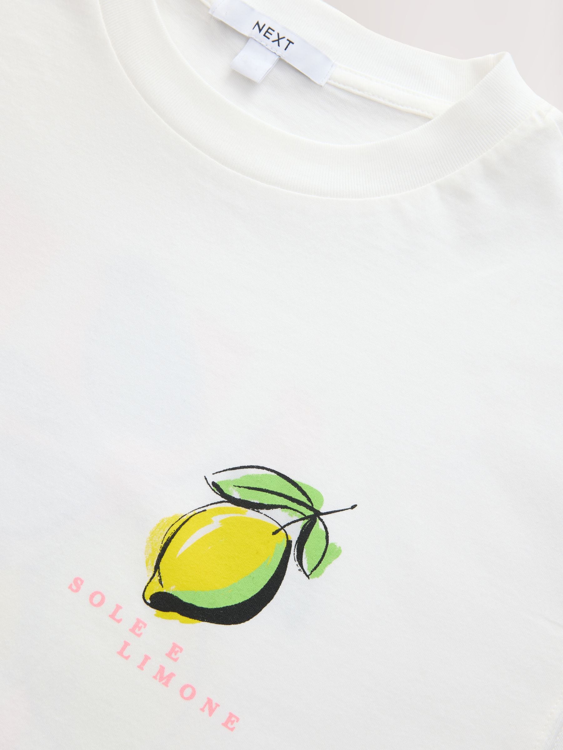 Buy Білий - Футболка Lemon Graphic принт круглий виріз з сайту