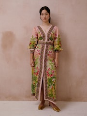 Raishma Jolene Dress A V-Neckline A Front Slit Long Puff Sleeves With Fitted Cuffs A Waistband With A Vertical Border Print Maxi Dress - Imagen 1 de 3