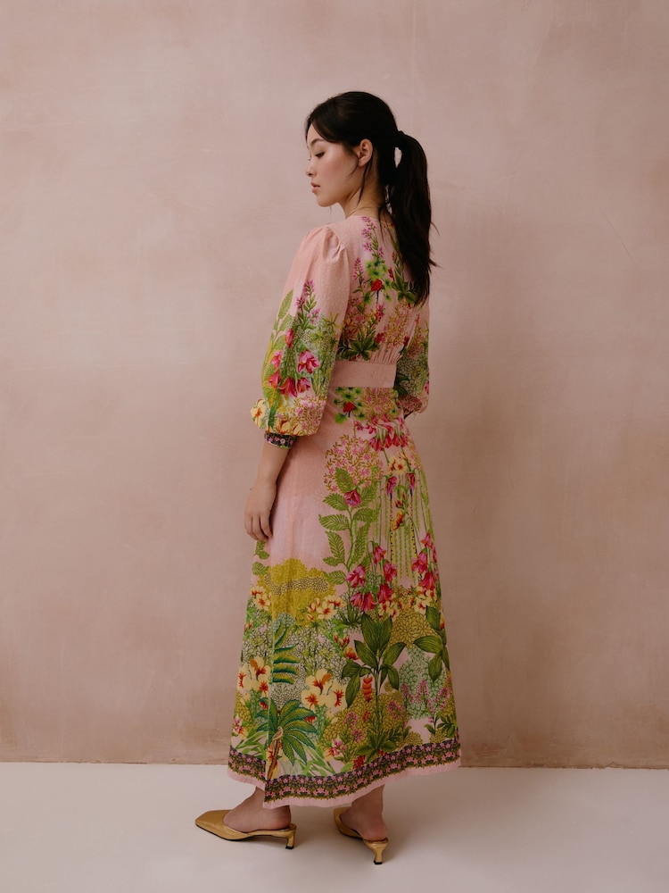 Raishma Jolene Dress A V-Neckline A Front Slit Long Puff Sleeves With Fitted Cuffs A Waistband With A Vertical Border Print Maxi Dress - Imagen 2 de 3