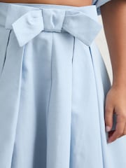 تنورة طيَّات متوسطة الطول بتفاصيل فيونكة Gigi من Reiss - Image 5 of 6