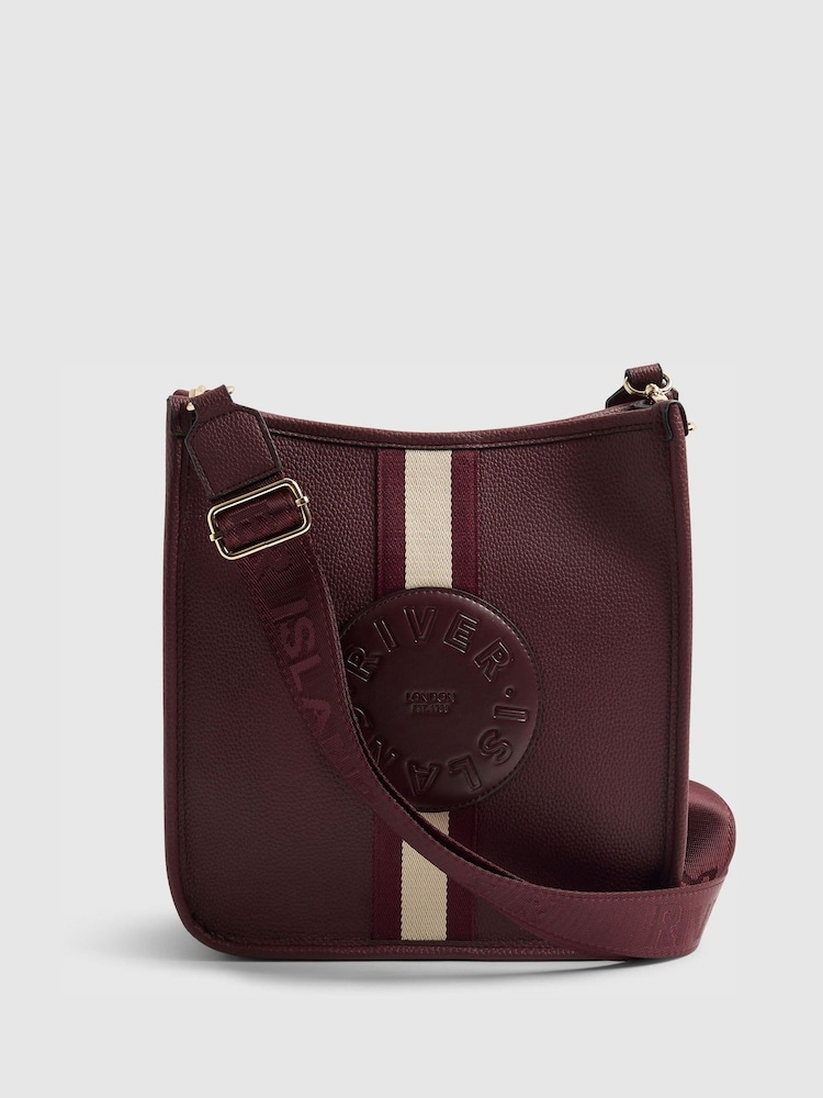 حقيبة Messenger أمامية مخططة بشعار من River Island - صورة 1 من 5 حقيبة Messenger أمامية مخططة بشعار من River Island - صورة 1 من 5